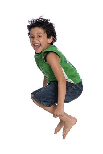 young boy jumping